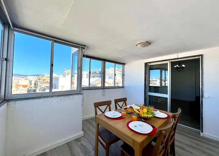 By Homing * Portimão